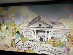 A mural painted at the main library depicting the library building and it's patron goers.