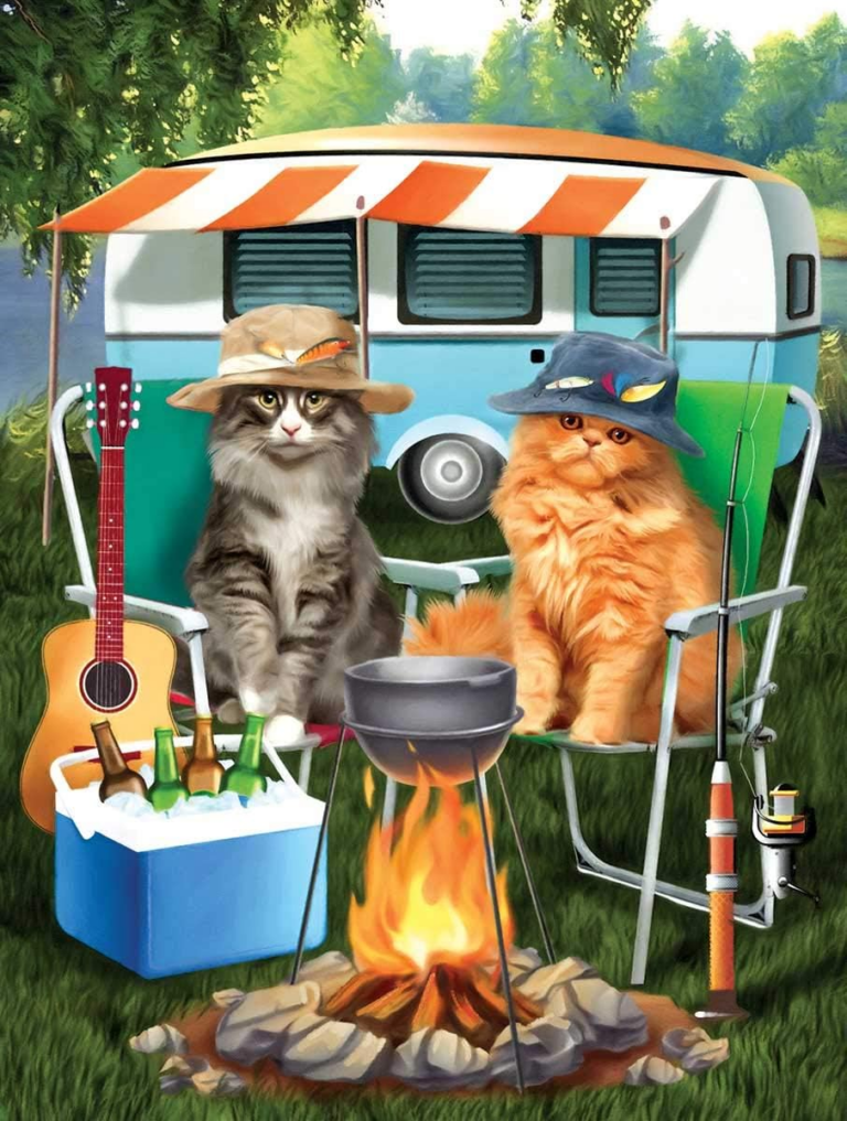 One orange cat and another grey cat are sitting in chairs around a campfire. They are wearing fishing hats.