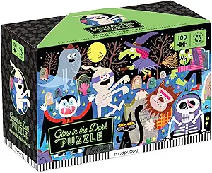 Glow in the dark puzzle with different monsters in a graveyard.