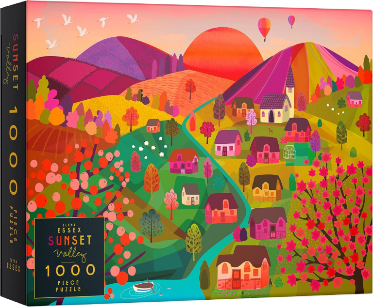 A colorful town within the mountains with a stream flowing through it. There are hot air balloons and geese flying by.